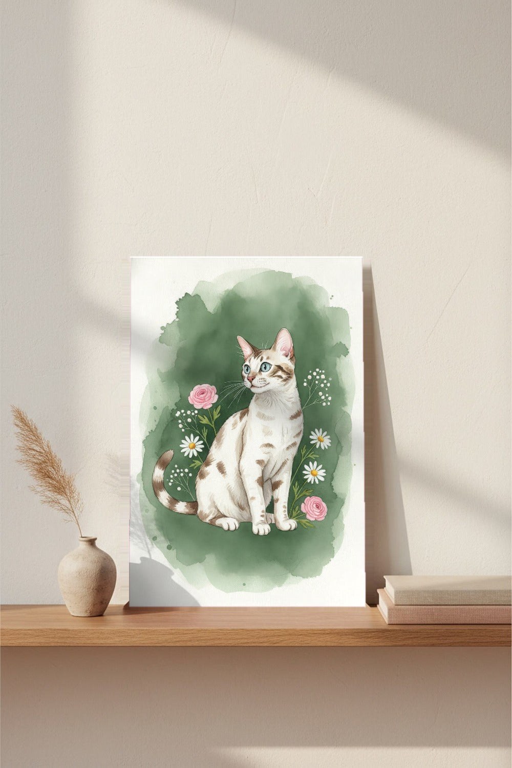 Snow - Bengal Cat watercolour print leaning on a picture ledge