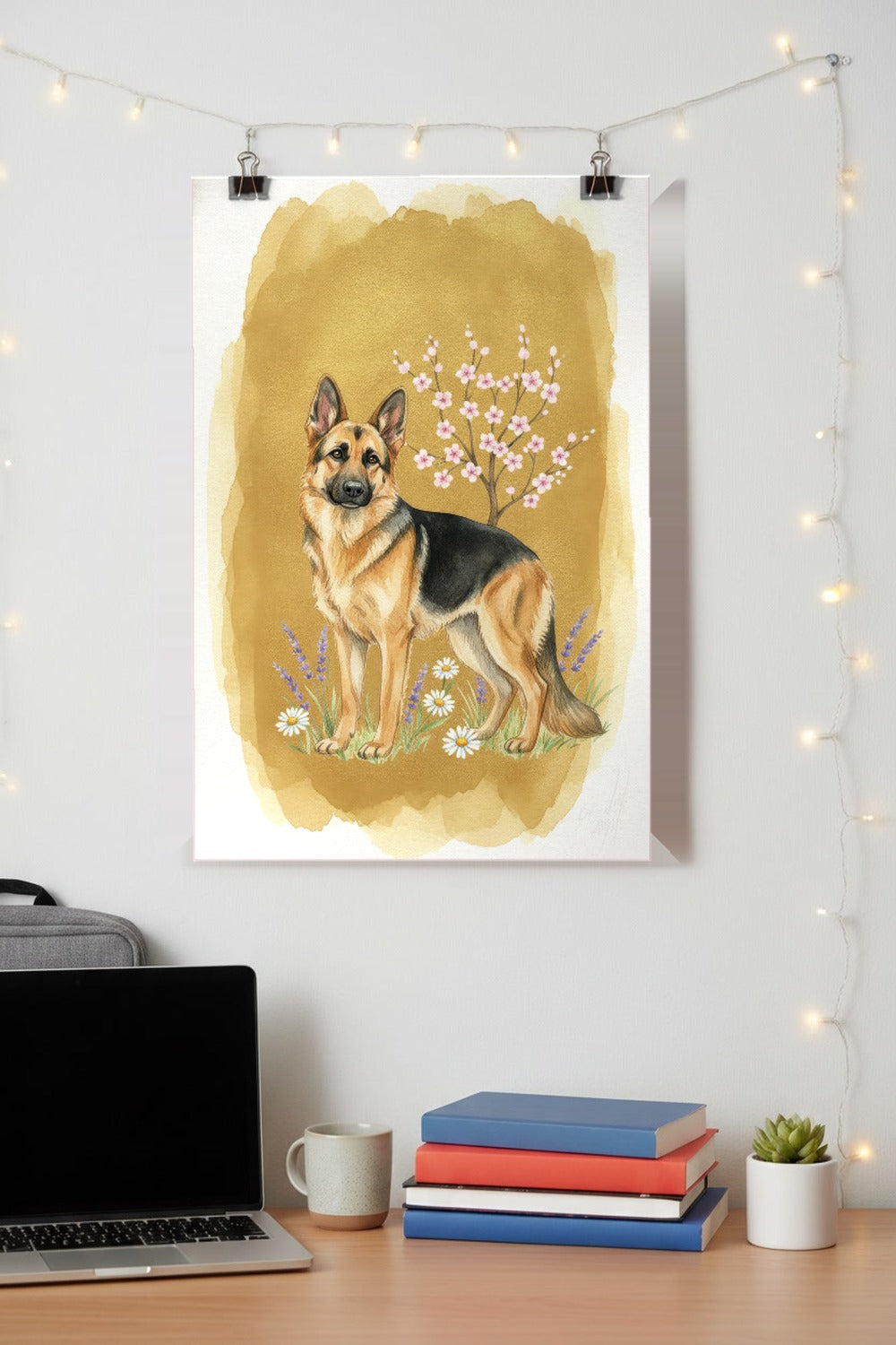 Black and Tan - German Shepherd watercolour print hung with clips above a student desk