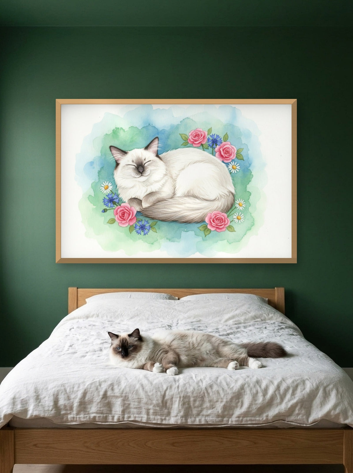 Seal Point - Birman Cat watercolour-style print, framed on the wall above a birman cat on a bed (AI-generated photo)