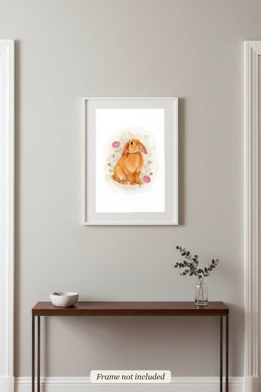 Orange - Holland Lop Rabbit watercolour print in a slim white frame (frame not included) in an entrance hall